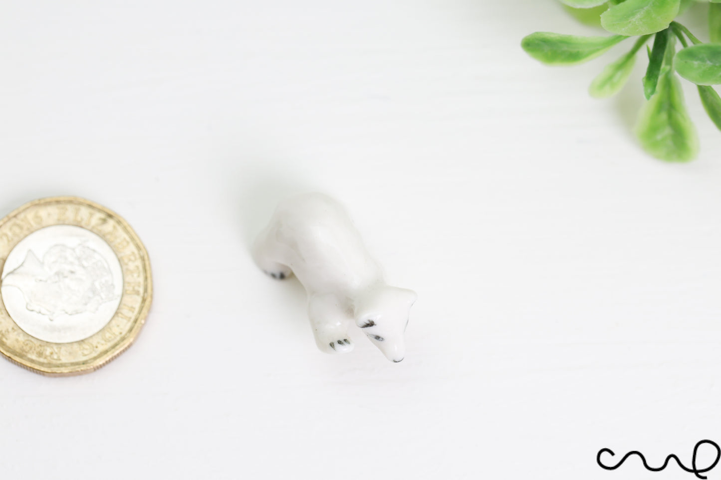 Hand-Painted Miniature Porcelain Polar Bear Figurine: Arctic Dollhouse Decor