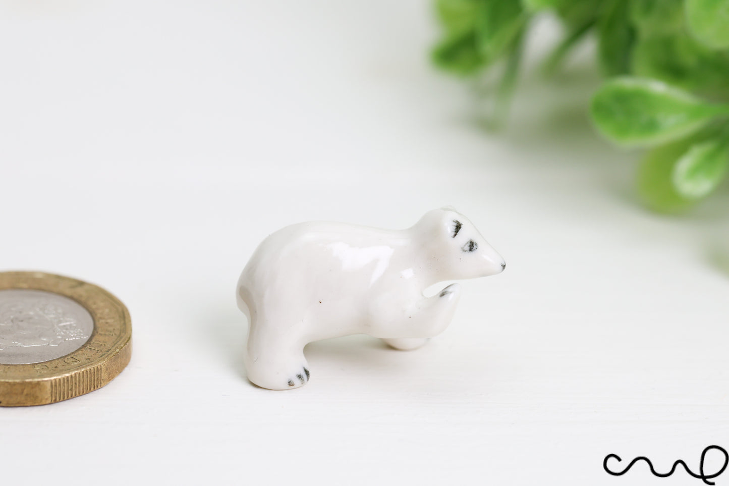 Hand-Painted Miniature Porcelain Polar Bear Figurine: Arctic Dollhouse Decor