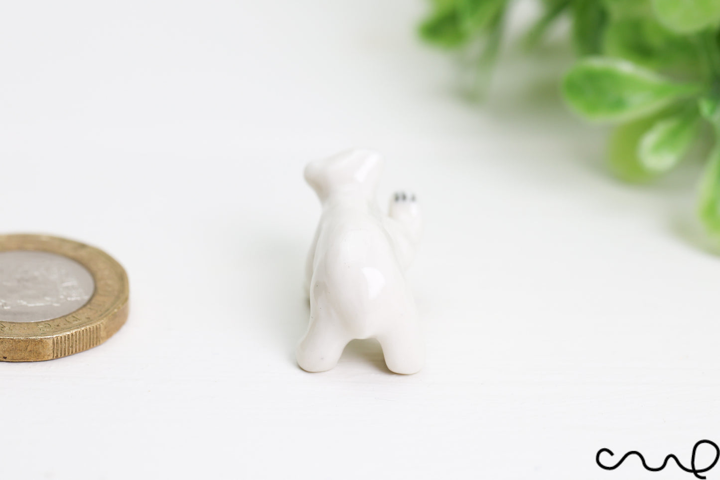 Hand-Painted Miniature Porcelain Polar Bear Figurine: Arctic Dollhouse Decor