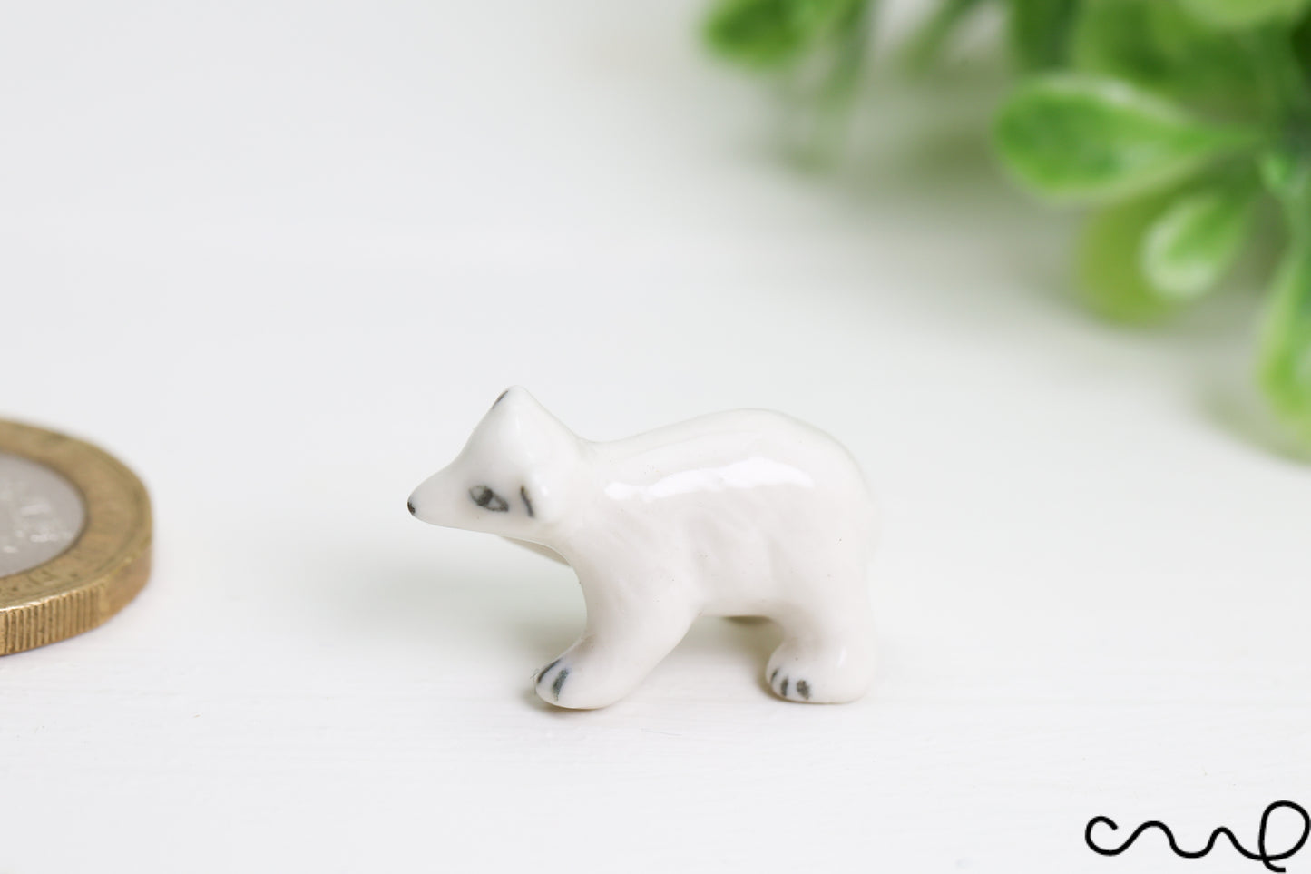 Hand-Painted Miniature Porcelain Polar Bear Figurine: Arctic Dollhouse Decor