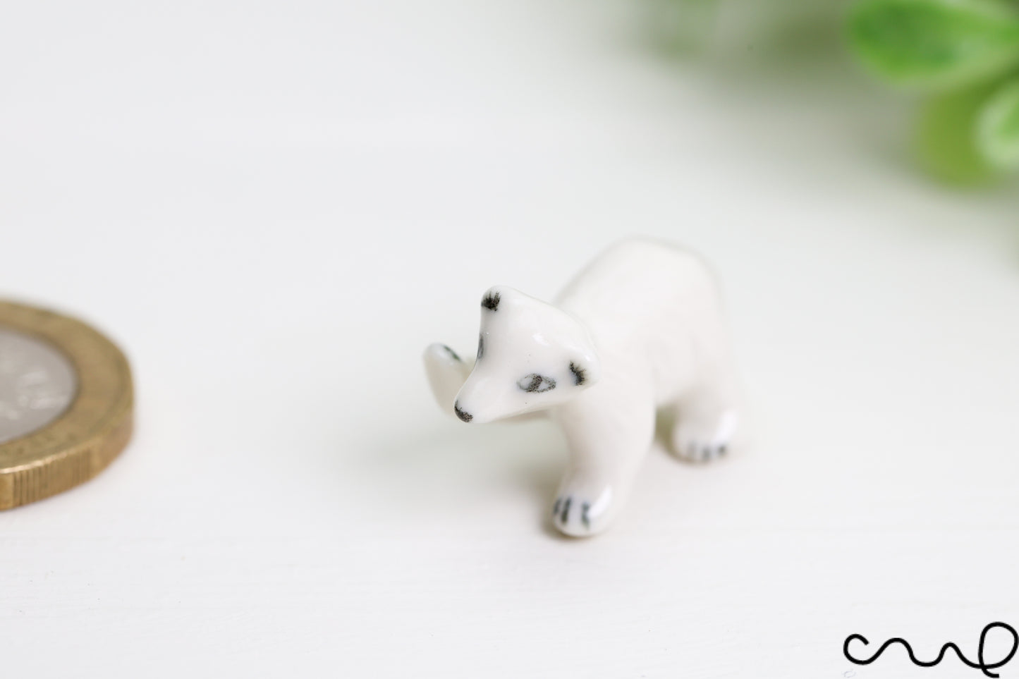 Hand-Painted Miniature Porcelain Polar Bear Figurine: Arctic Dollhouse Decor