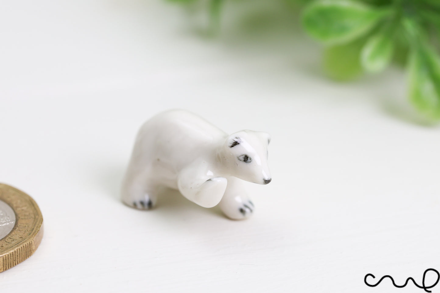 Hand-Painted Miniature Porcelain Polar Bear Figurine: Arctic Dollhouse Decor