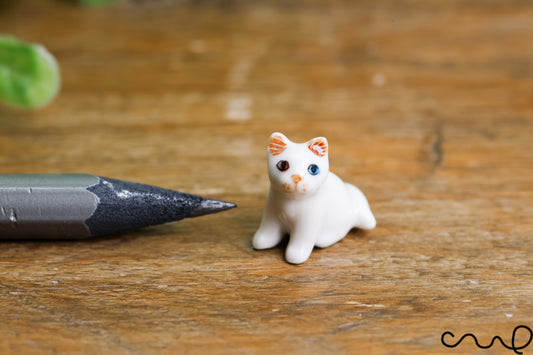 Handmade Ceramic Cat Figurine: Tiny Odd-Eyed White Ornament